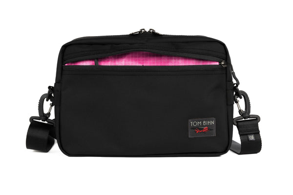 The Side Hustle in Black Ballistic with Cerise (pink) 200 Halcyon interior.